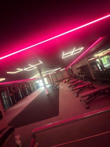 upstairs in the gyms functional space with red LED lighting