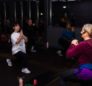 group exercise class lunging