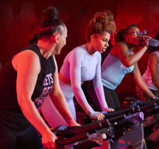 Women taking part in a spinning class